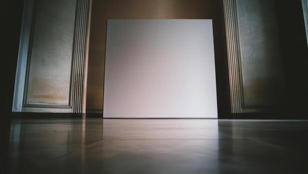 Canvas positioned on polished floor in a softly lit interior space during daylight hours photo