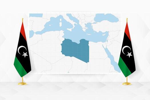 Map of Libya and flags of Libya on flag stand. vector