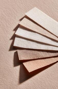 Fabric samples showing different neutral colors and textures photo