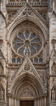A large ornate building with a large window photo