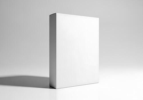 A Clean White Blank Product Box Mockup Standing Vertically On A Reflective Surface Against A Soft Grey Background. Ideal For Product Presentation. photo