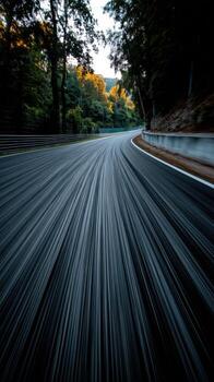 A blurry image of a road with motion blur photo