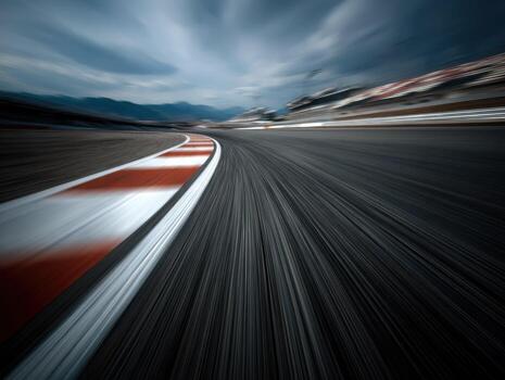 A blurry image of a racing track with a red stripe photo