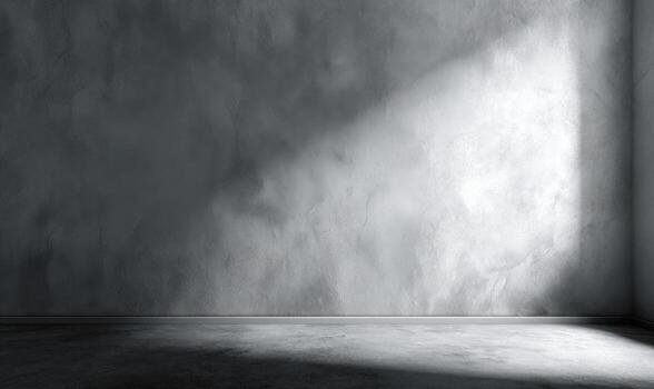 An empty room with a light shining on the wall photo