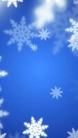 festlig abstrakt bakgrund med lysande vit snöflingor på en blå bakgrund video