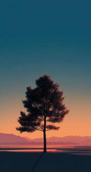 A lone tree stands in the middle of a field at sunset photo