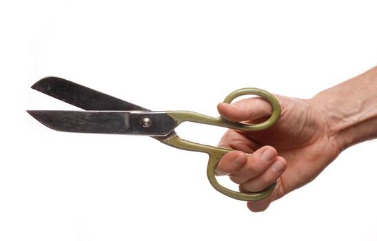 Scissors in the hands of a man and a tailor on a white background isolate photo