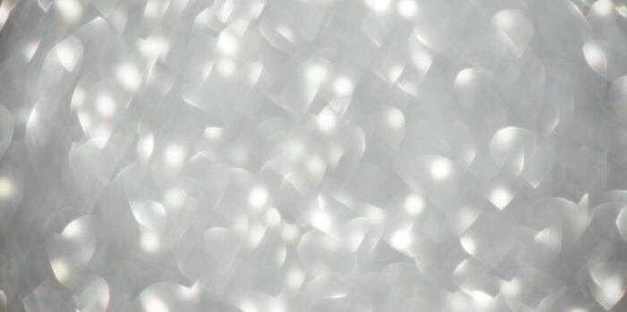 Abstract soft light bokeh background with circular patterns and gentle glow. photo