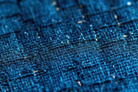 Detailed close-up of blue textured fabric showcasing woven patterns photo