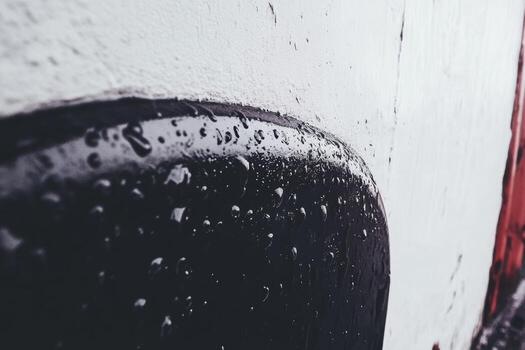 Raindrops on a textured surface during a cloudy afternoon photo