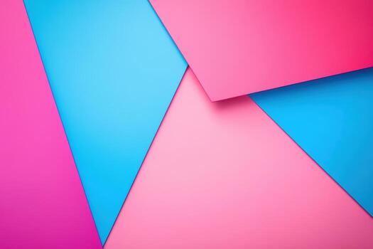 Vibrant layers of pink and blue paper create a striking visual contrast photo