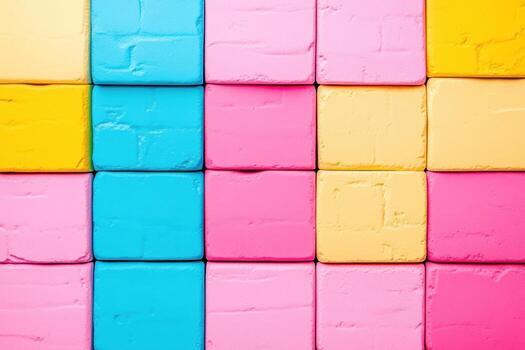 vistoso pastel bloques arreglado en un geométrico modelo en un plano superficie foto