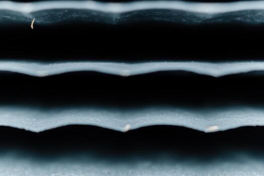 Layers of textured paper showcasing depth and design in close-up view photo