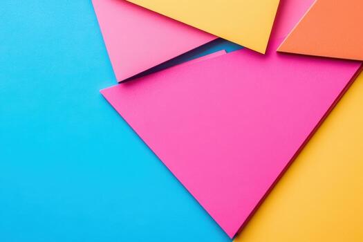 Colorful paper shapes arranged on a blue background for creative projects photo