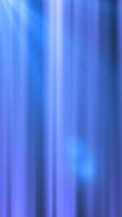 Abstract vertical blue light beams creating a glowing futuristic background with smooth gradients video