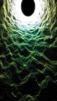 Abstract glowing green vortex with flowing dotted wave patterns forming a luminous tunnel video