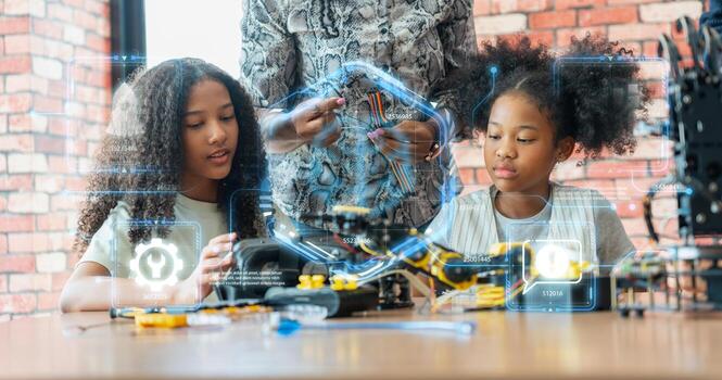 Young Girls Engaged in Robotics and STEM Learning, Diverse Kids Building a Robot Arm in a Science Workshop, Girls with a Teacher in a Robotics and AI Class photo