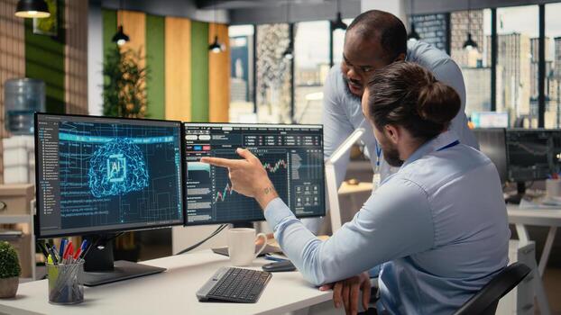 Prop firm manager and employee looking over paperwork, using deep learning to assess stock market volatility. Brokerage company team leader and worker using AI to generate investment reports photo