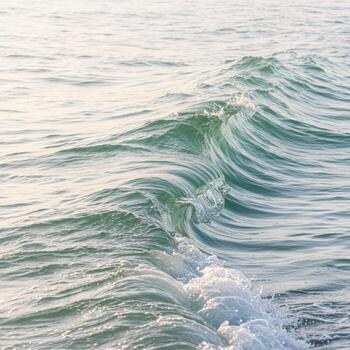 A wave is breaking on the ocean background photo