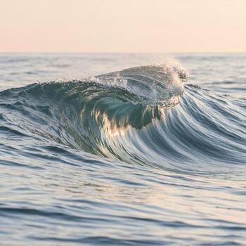 A wave is breaking on the ocean photo