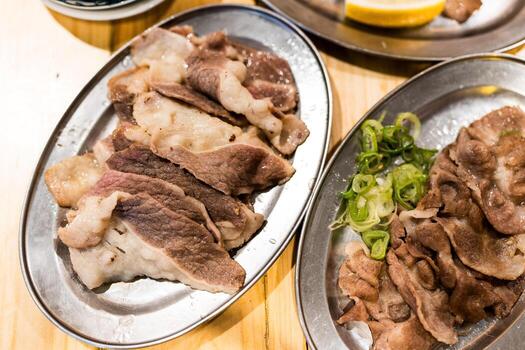 Grilled beef tongue slices, creating flavorful and appetizing presentation photo