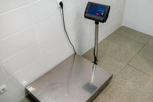 Weighing scale positioned on a sleek surface in a modern environment photo