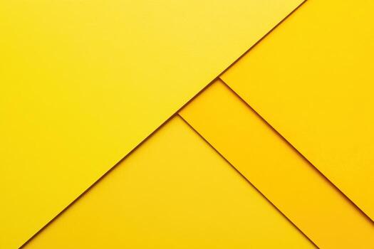 Bright yellow geometric patterns arranged in layers on a flat surface photo