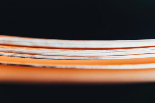 Brightly colored pages with distinct textures captured in close-up view photo