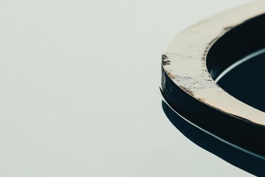 Reflective circular surface demonstrating intricate details and depth photo