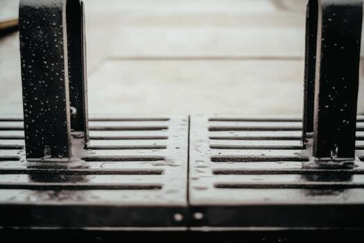 Wet metal surface and distorted reflection captured on a rainy day photo