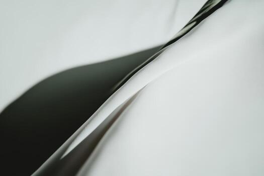 Close-up view of smooth fabric creating elegant shadows and textures photo