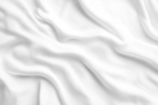 Soft white fabric draped elegantly on a flat surface photo