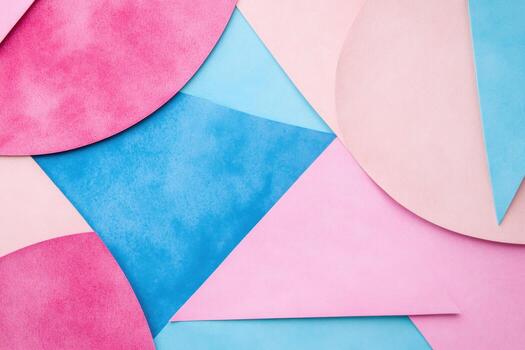 Colorful geometric shapes create vibrant patterns on a flat surface photo