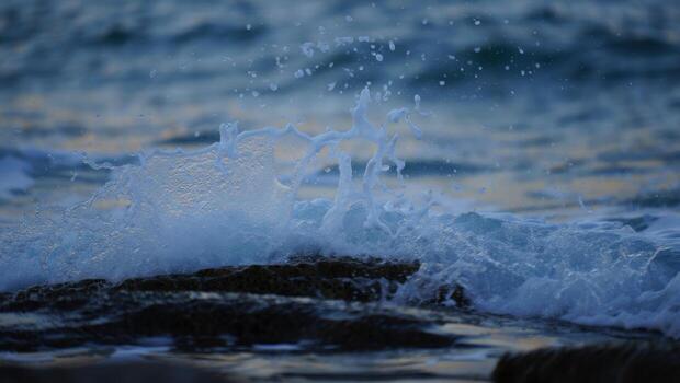 Abstract blue and white textured background with subtle pattern and dark foreground elements photo