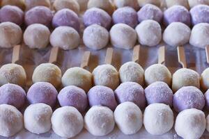 skewer of round daifuku mochi,japanese dessert. photo