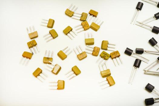 Electronic bipolar transistors. Close-up view. Microelectronics background. photo