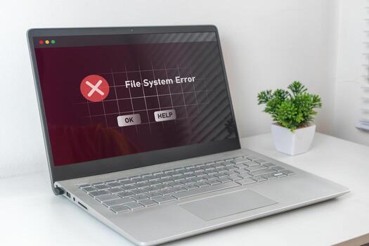 A computer laptop with operation error message. System error, file system error or critical error. photo