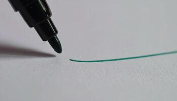 Macro gel pen tip leaving fresh ink line detail with negative copy space on pale background stationery writing tool design advertising template photo