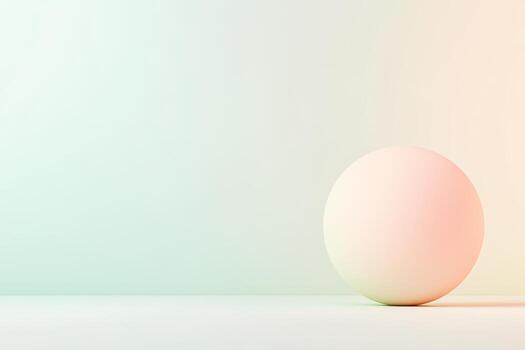 A smooth sphere rests on a flat surface, reflecting a subtle gradient of pastel colors against a softly blurred background, creating tranquility photo