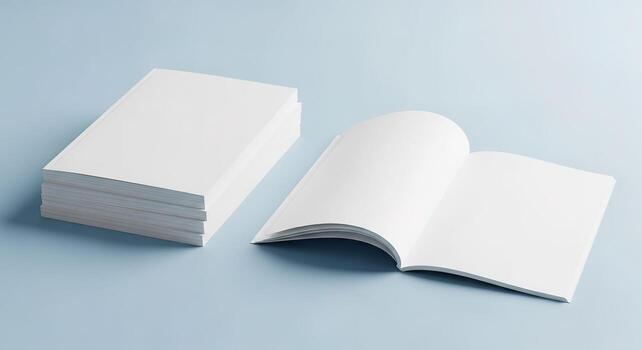 Stack of Blank Books and Open Booklet on Light Blue Background photo