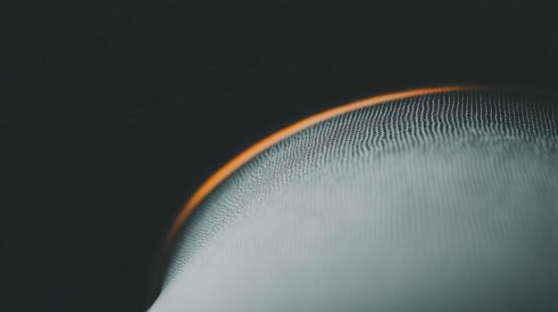 Close-up view of intricate texture on smooth surface illuminated by light photo