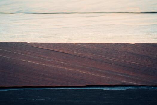 Textured wood surface showcasing natural colors and patterns at sunset photo