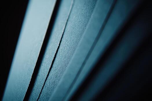 Close-up view of textured dark paper layers showcasing subtle details photo