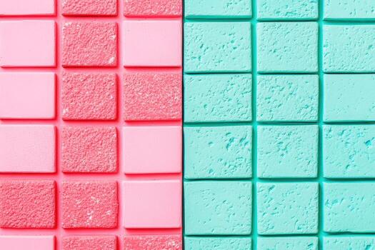 Colorful pink and blue textured tiles arranged in a grid pattern photo