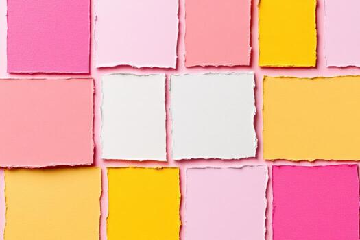 Colorful array of torn paper squares arranged in a vibrant pattern photo