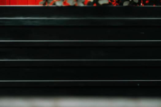 Decorative wall with vibrant colors and greenery in urban setting photo