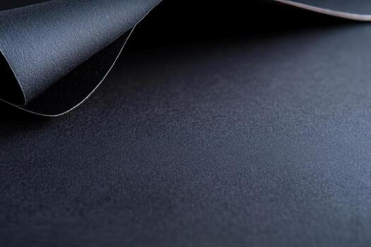 Textured black paper rolls used for various crafting projects photo