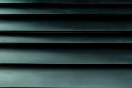 Modern black staircase design featuring sharp linear patterns photo