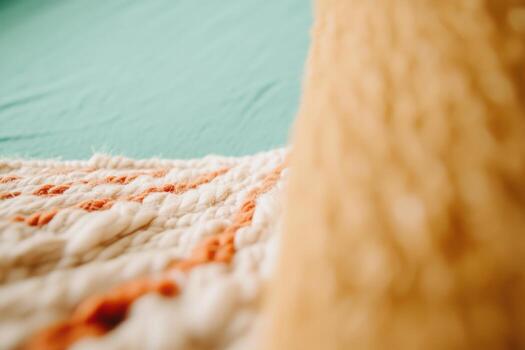 Soft texture of woven fabric against a solid background in bright light photo