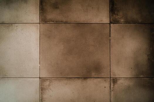 Concrete floor tiles with varying shades and textures in a modern setting photo